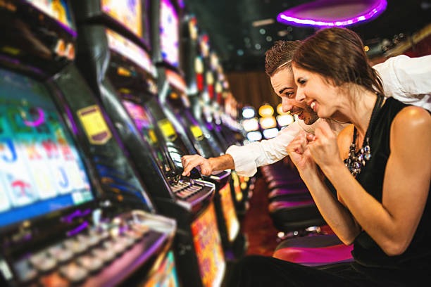 Mobile phone showing Texas Poker betting interface with fold, check, and raise buttons on jalantoto login